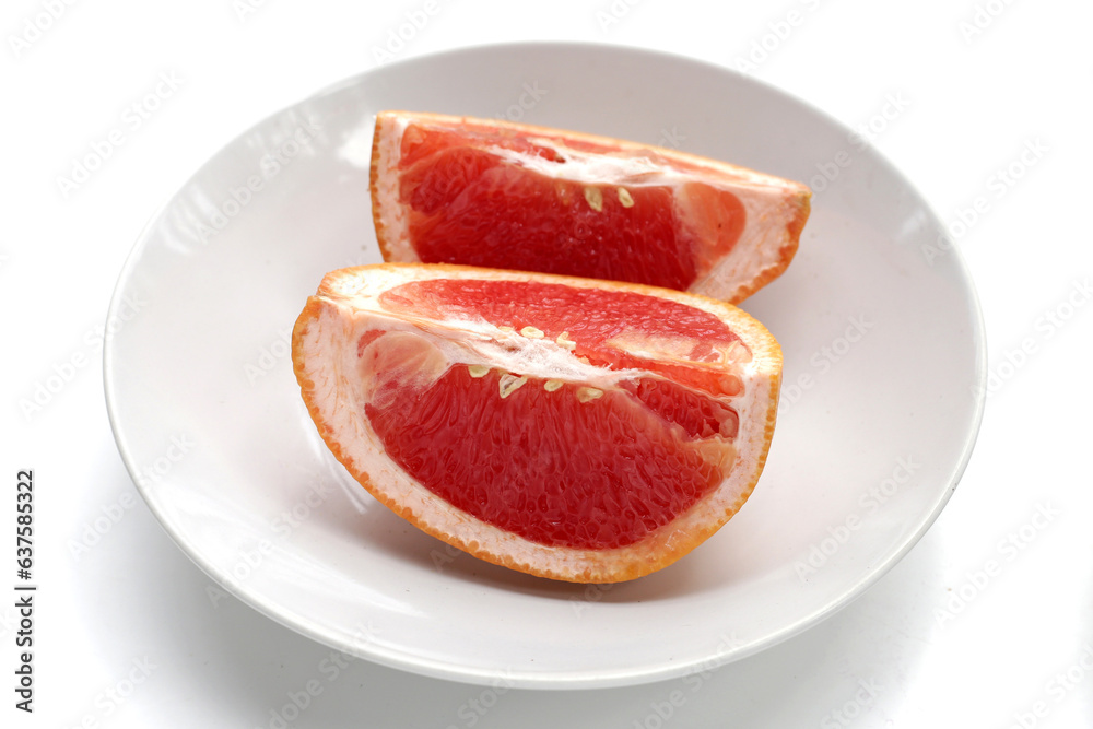 Fresh grapefruit on white background.