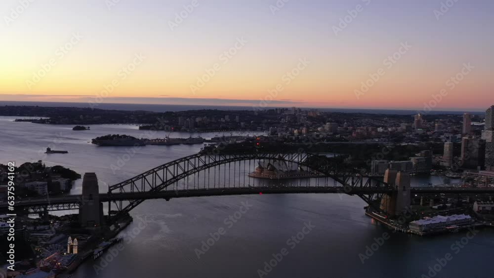 Pink aerial sunrise over Sydney city harbour waterfront in Australia – 4k.
Pink aerial sunrise over Sydney city harbour waterfront in Australia – 4k.