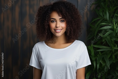 Beautiful woman in white t-shirt with wooden background © ardanz