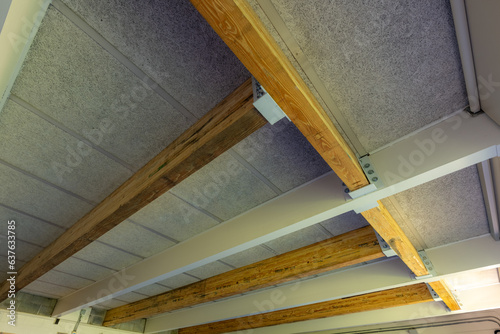 Use of sustainable timber glue laminated beams to reinforce an existing building. 