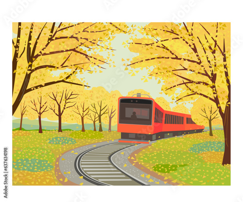 秋の風景　銀杏の木と電車