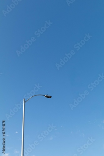 Street light pole with a blue sky