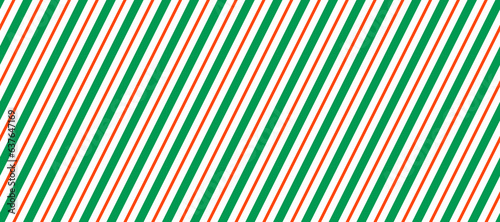 Candy cane seamless pattern. Green and red diagonal stripes background. Christmas repeating decoration texture. Winter holiday line backdrop. Xmas peppermint package wrapping print. Vector wallpaper