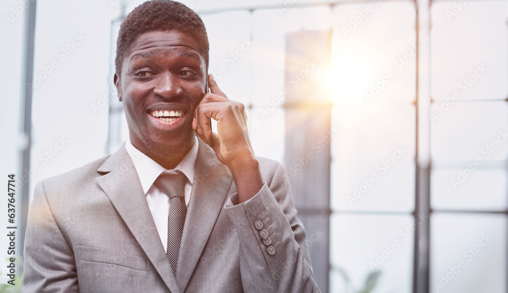 Portrait of a serious entrepreneur making a phone call Portrait of a serious entrepreneur making a phone call