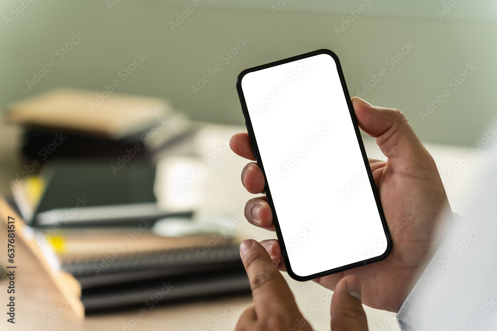 businessman holding a blank screen smartphone mobile with blank screen blank for your advertising text message communication background workplace job copy space