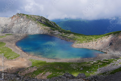 Mount Norikura  Norikura-dake  is a potentially active volcano located on the borders of Gifu and Nagano prefectures in Japan. It is part of the Hida Mountains and is listed among the 100 Famous Japan