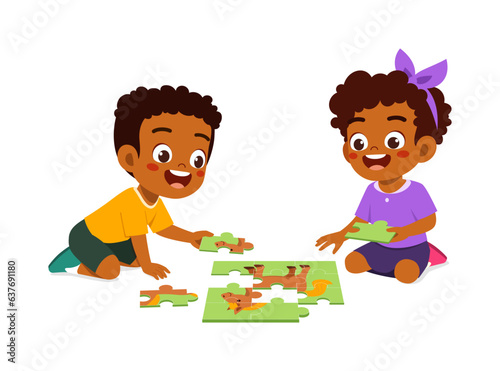 little kid play puzzle with friend and feels happy