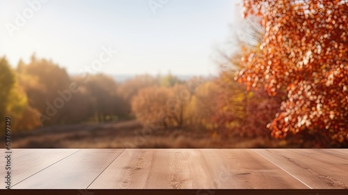 empty wooden table in modern style for product presentation with a blurred autumn landscape in the background