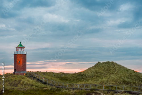 Sunset landscape with a lighthouse on Sylt island, Germany © YesPhotographers