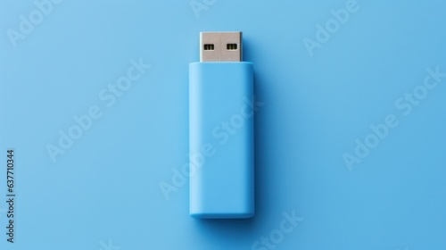 USB flash drive isolated on blue background. photo