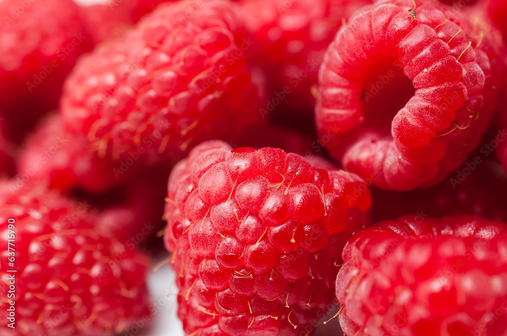 Delicious fresh ripe raspberries on white background