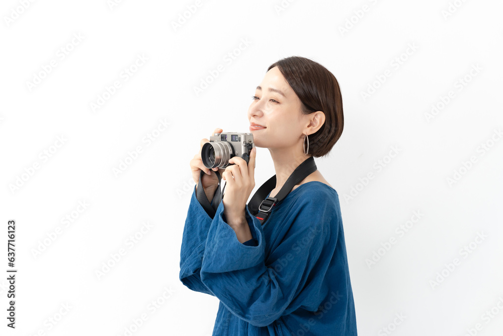 カメラを持つ女性