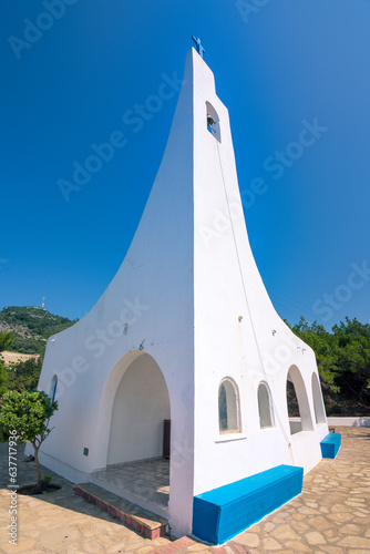 White church in Potami beach with azure sea water, Samos island, Greece photo