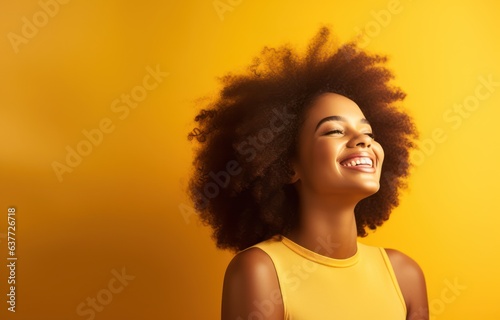 Beautiful african american woman with afro hairstyle, fashion and makeup, portrait photo with golden light shining, diverse cultural black woman
