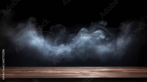 Smoke rising from empty wooden table on dark background - product display space