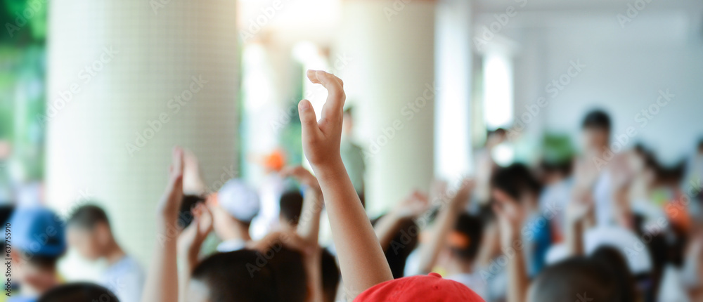 Group of happy children with their hands up Group of happy children with their hands up
