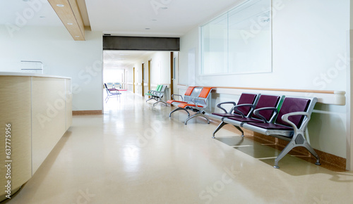 Empty nurses station and corridor in a hospital photo