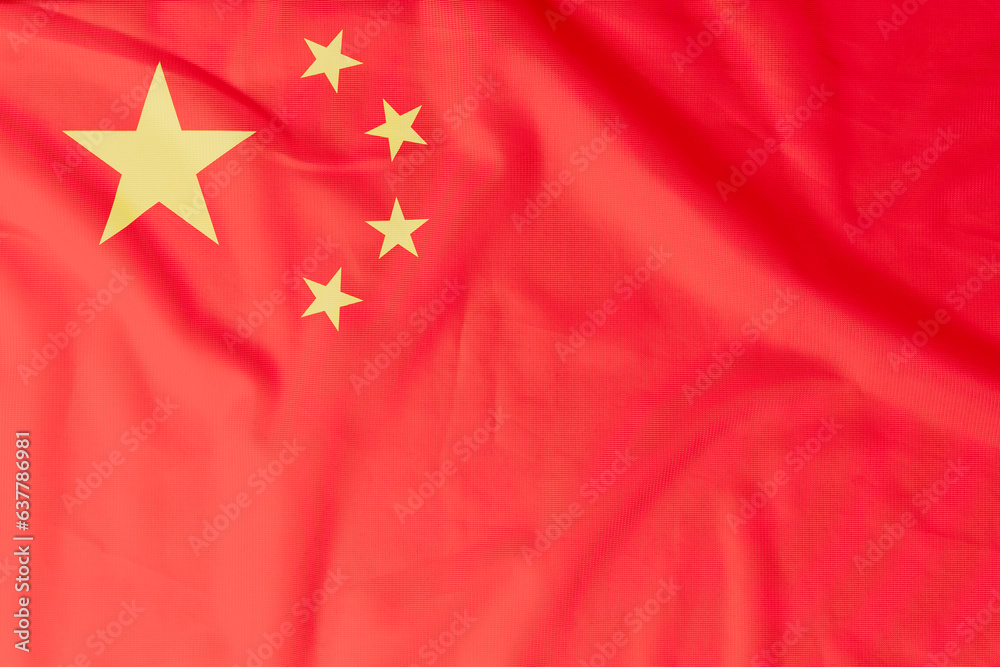 Flag of People's Republic of China (PRC) with natural material creases as a background