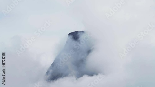 Clouds Engulfing Stetinden Summit Near Narvik In Nordland County, Norway. Aerial Shot photo