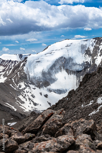 Peak Karnizny with a huge glacier from Tourist Peak. Altitude 4075 meters. With foreground