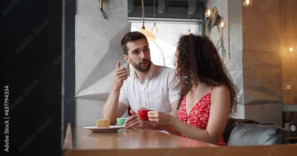 Happy couple spending time together in cafeteria Happy couple spending time together in cafeteria