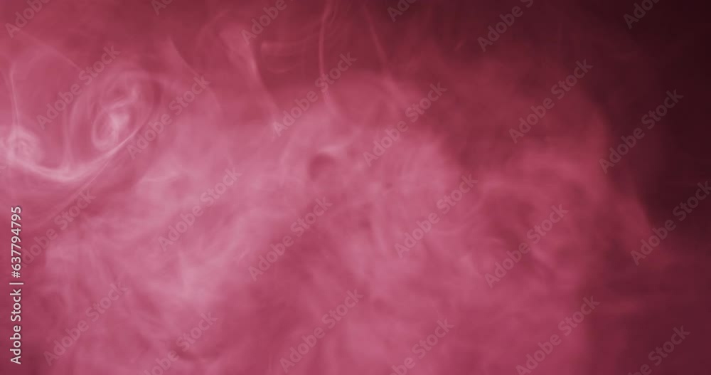 Video of red clouds of smoke moving with copy space on black background