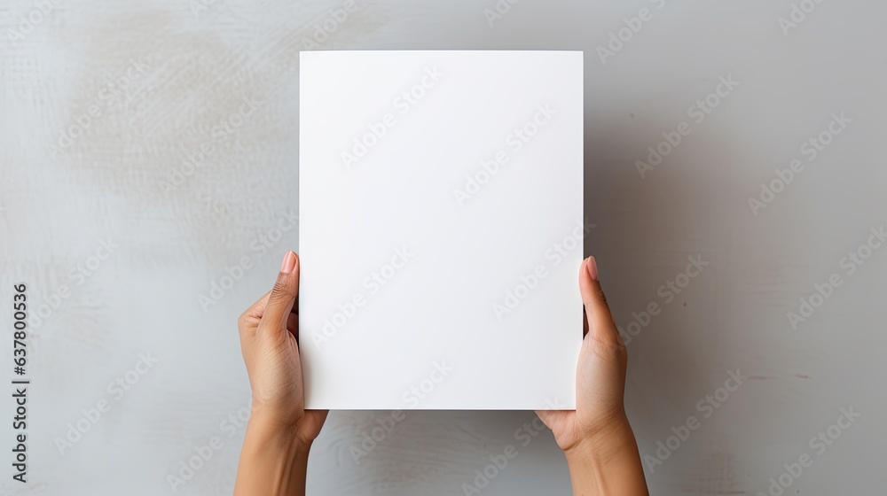 Female hands holding blank magazine gray background design template. Mockup image
