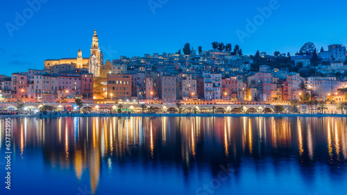 фотография Cityscape of Menton at night, a historic town in the Provence-Alpes-Côte d'Azur