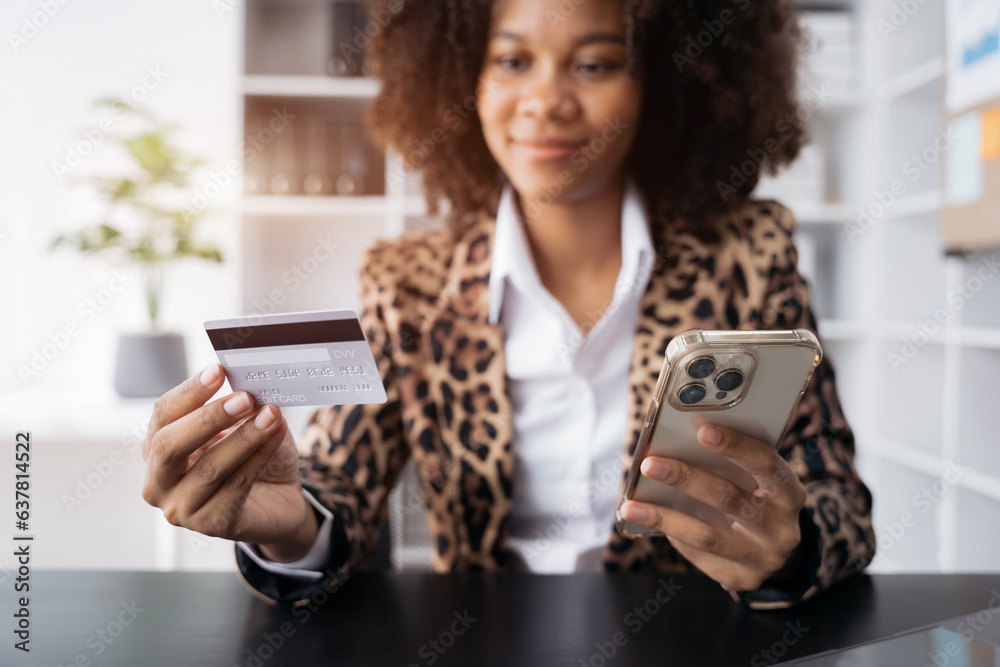 Closeup women holding hand credit card.businessman use smartphone online payments shopping in the morning. Closeup women holding hand credit card.businessman use smartphone online payments shopping in the morning.