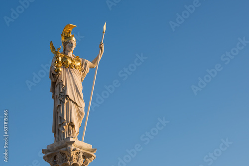 The statue of Athena. Member of the Twelve Olympians, goddess of wisdom, warfare, and handicraft. Vienna, Austria photo