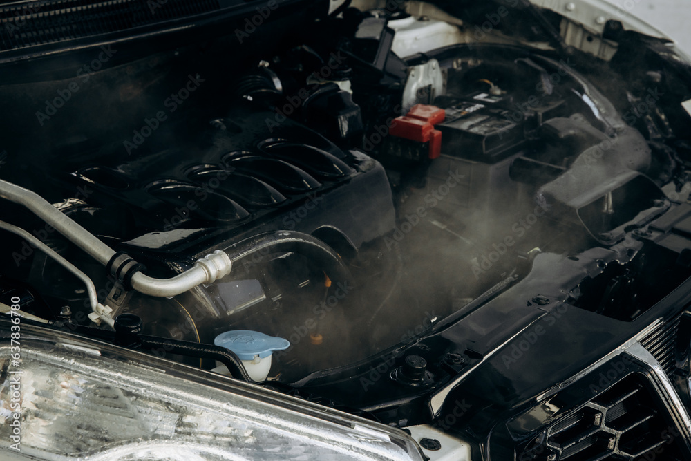 Evaporation from the engine. The car engine close up. Auto service and