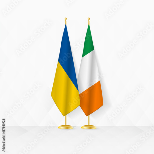 Ukraine and Ireland flags on flag stand, illustration for diplomacy and other meeting between Ukraine and Ireland.