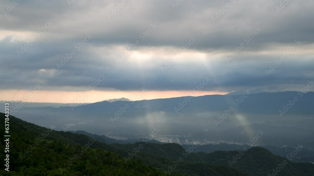 Heavenly Glows: Watch Crepuscular Rays amidst Transforming Clouds on the Peak. The Wufenshan Weather Radar Station stands on the top of the mountain. Taiwan Heavenly Glows: Watch Crepuscular Rays amidst Transforming Clouds on the Peak. The Wufenshan Weather Radar Station stands on the top of the mountain. Taiwan