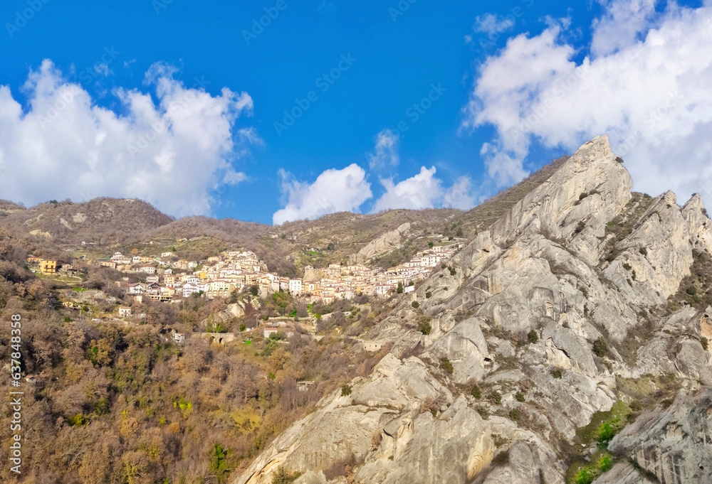 Pietrapertosa (Italy) - A view of little old village, dug into the rock in the natural park of the Dolomiti Lucane, Basilicata region, famous also for the alpinistic ways. Pietrapertosa (Italy) - A view of little old village, dug into the rock in the natural park of the Dolomiti Lucane, Basilicata region, famous also for the alpinistic ways.