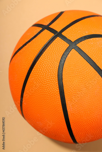 Basketball ball on beige background, concept of balls © Atlas