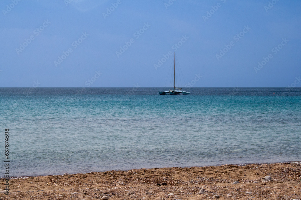 Lonely catamaran in a shore
