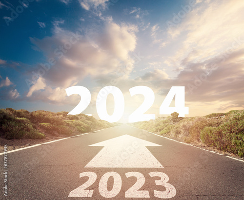 Road and New year 2024 concept. Driving on an empty road to Goals 2024.