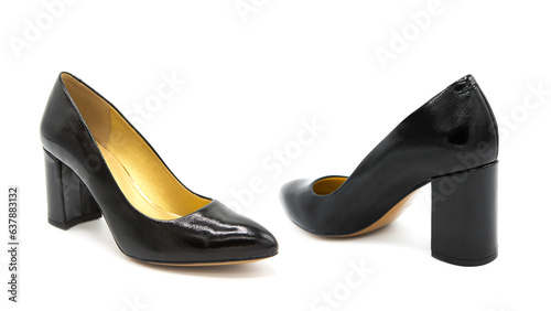 Pair of trendy patent leather shoes isolated on white background.