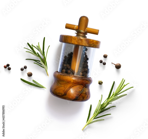 Φωτογραφία traditional italian pepper shaker and green organic rosemary leaves isolated on white background