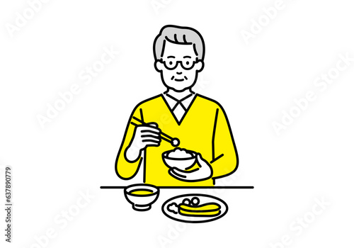 食事をするシニアの男性