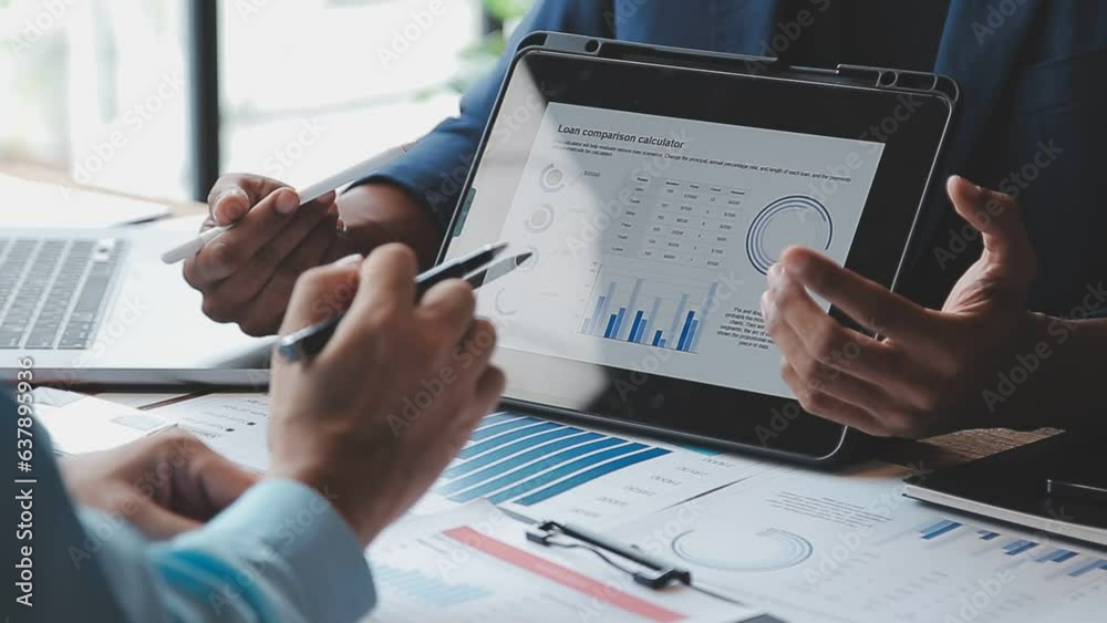 Financial Business team present. Business man hands hold documents with financial statistic stock photo, discussion, and analysis report data the charts and graphs. Finance Financial concept