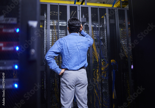 Server room, cables or confused man with hardware for cybersecurity glitch or software solution. Doubt, man or back of stressed male engineer fixing network for information technology or IT support