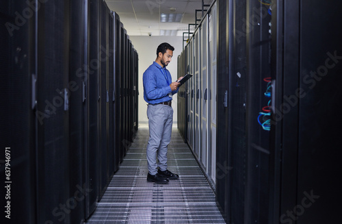 Tablet, man and engineer in server room, research and programming. Information technology, reading and technician in data center, network on cybersecurity and coding software of system admin typing