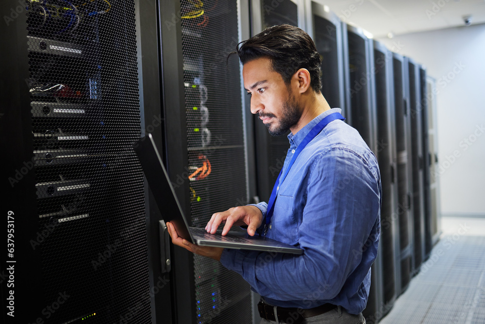 Programming, data center and a man with a laptop for maintenance, cyber security and internet check. Coding, email and an Asian programmer typing on a computer for network or server analytics Programming, data center and a man with a laptop for maintenance, cyber security and internet check. Coding, email and an Asian programmer typing on a computer for network or server analytics
