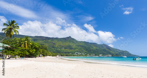 Panoramic landscape of Beau Vallon beach on a sunny summer day