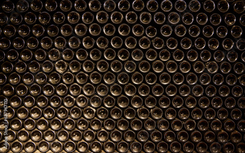 Bottles in a cellar. Glass containers piled up in the warehouse of a wine distributor