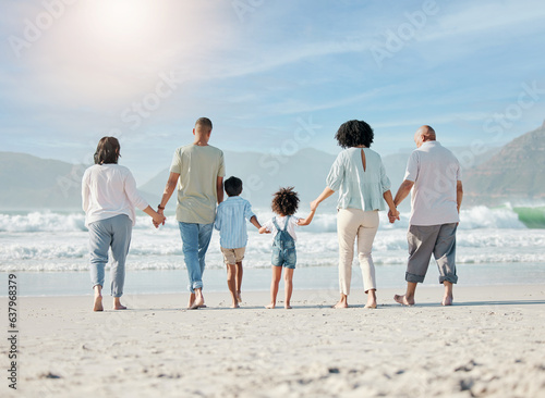 Back, beach and family holding hands, walking and summer vacation with bonding, love and travel. People, grandparents and mother with father, children and kids with seaside holiday, ocean and care