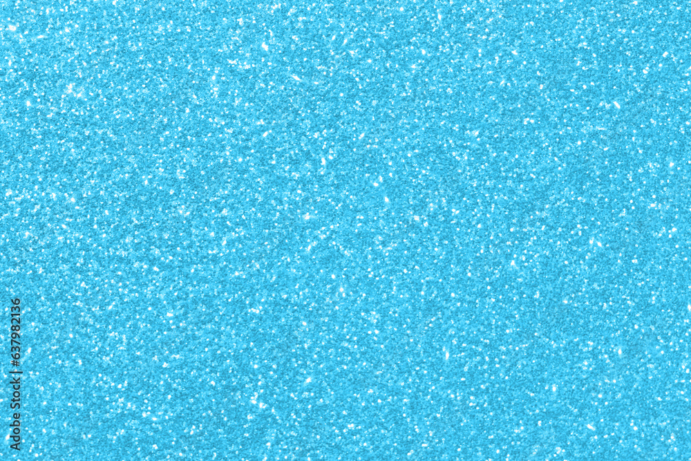 Blue glitter texture background.  Photo can be used for the concept of New Year, Christmas and all celebration background concepts. 