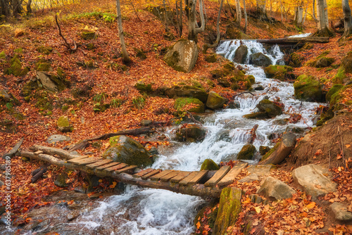 Majestic Autumn River Serenely Flowing Through the Mountainous Forest © Ryzhkov Oleksandr