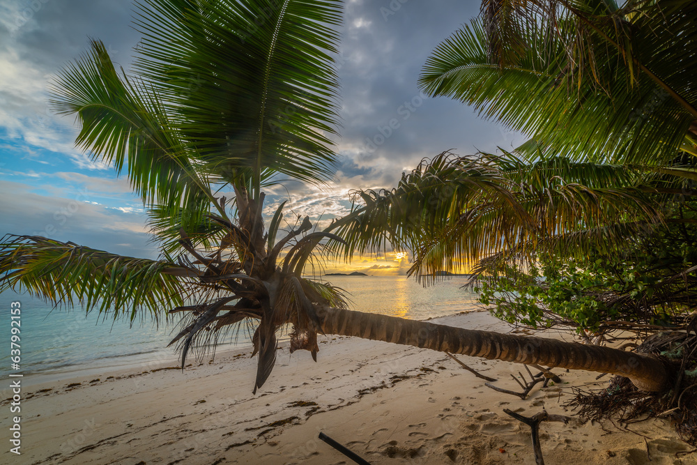 Sunset in Grande Anse beach in Praslin island